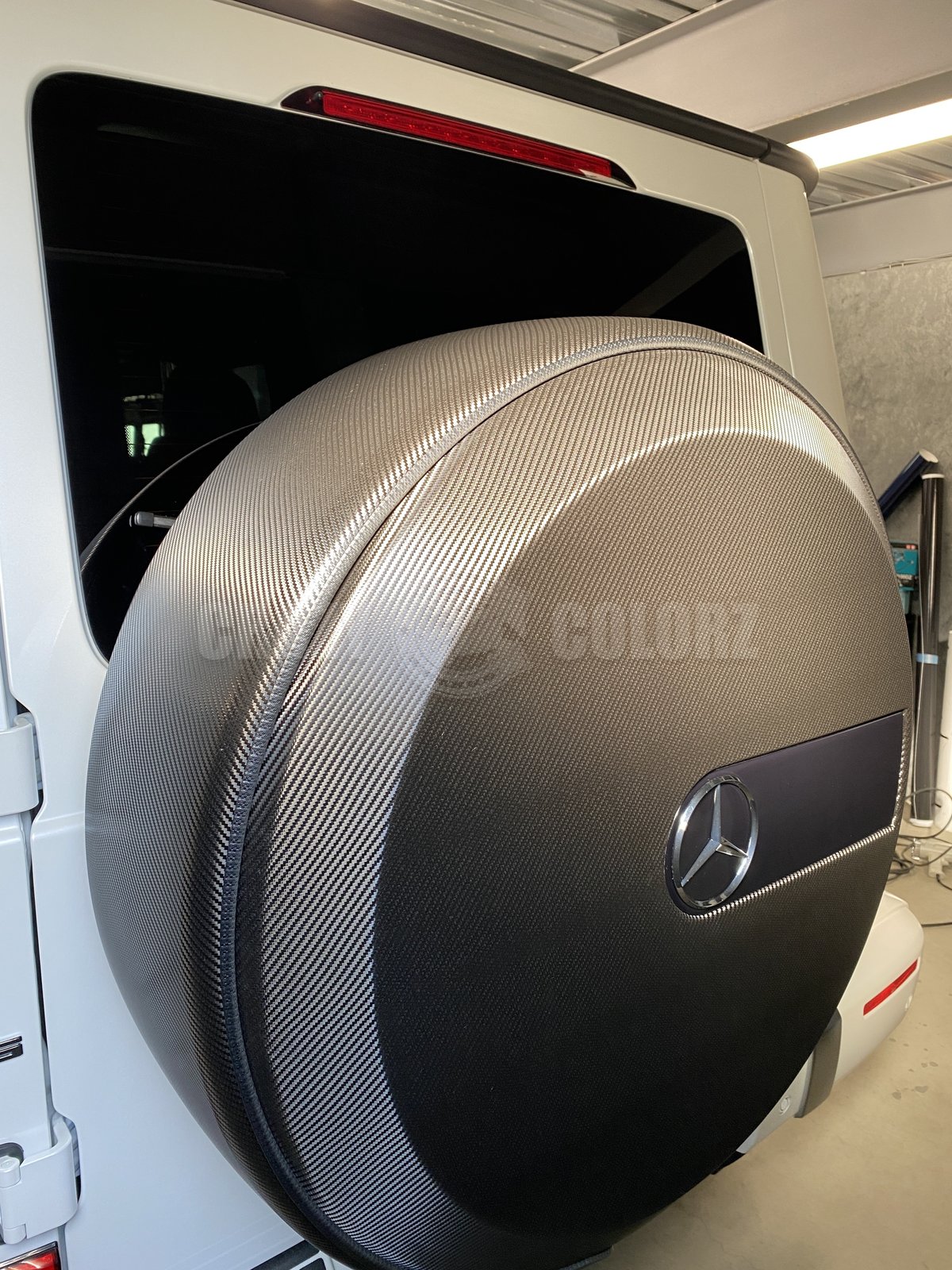 Mercedes-AMG Gクラスのスペアタイヤカバーのカーボンラッピング 東京